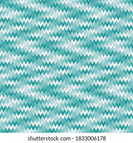 Nahtlose Strickmuster von Türkis 
und weiß. Handgemachte strickte Textilinitiative. Abstrakter geometrischer Hintergrund
