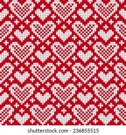 Seamless knitted pattern with white hearts on a red background