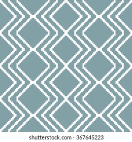 Seamless knitted pattern in white and muted blue colors. Stair step vertical zigzag forms diamond shaped ornament. Elegant geometric print. Vector illustration for various creative projects