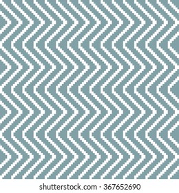 Seamless knitted pattern in white and muted blue colors. Stair step vertical zigzag. Elegant geometric print. Vector illustration for various creative projects