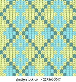 Seamless knitted pattern. yellow background with light blue rhombus. Color vector illustration. wool repeated background