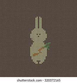 Seamless knitted rabbit with a carrot.