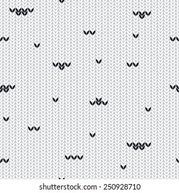 Seamless knitted white pattern with black strokes. Black and white pattern
