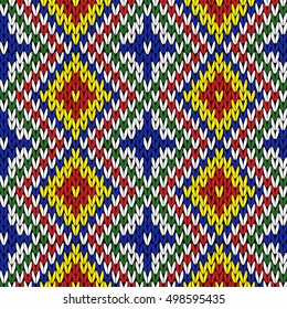 Seamless knitting geometrical colourful vector pattern in yellow, orange, green, blue, red and white colors as a knitted fabric texture 