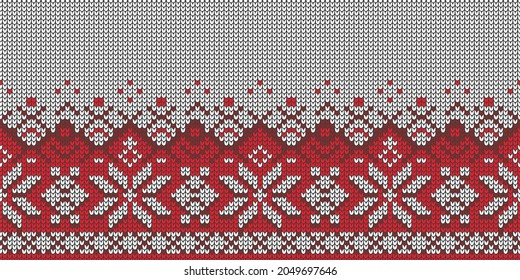 Seamless knitting pattern in red and white colors.Cristmas knit geometric ornament with emply place for text.Norway festive sweater fairisle design.Knitted textured background.