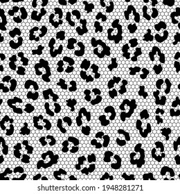 Seamless lace fabric pattern. Black mesh with a leopard print on a white background.