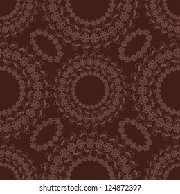 Seamless lace pattern on a brown background