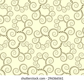Seamless lace pattern. Vintage, curled texture. Spiral, twirl silhouettes with laurel leaves. Floral theme. Twist ornament. Yellow green figure on light background. Gold colored. Vector illustration