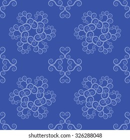 Seamless lace pattern. Vintage, curled texture. Spiral, swirl silhouettes floral snowflakes. Twist ornament of laurel leaves. Light figure on blue background. Blue colored. Vector