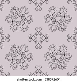 Seamless lace pattern. Vintage, curled texture. Spiral, swirl silhouettes floral snowflakes. Twist ornament of laurel leaves. Dark gray figure on light gray background. Silver colored. Vector