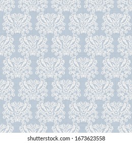 Seamless leaf pattern in french blue linen shabby chic style. Hand drawn floral damask texture. Old white blue background. Interior wallpaper home decor swatch. Ornate flourish motif all over print