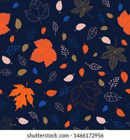 seamless leaf pattern on blue background, made by hand
