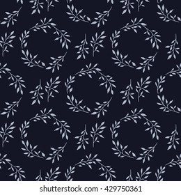 Seamless leaves circles pattern. White stems on black background. Hand drawn floral elements.