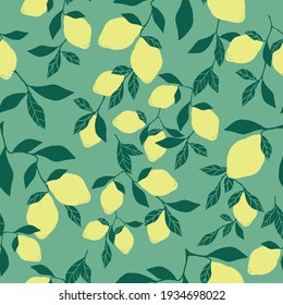 seamless lemon pattern . green background. juicy lemons on a branch. vector texture. bright print for textiles and wallpaper.