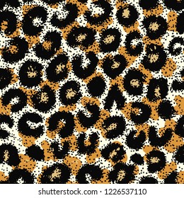 Seamless leopard, ocelot or wild cat fur pattern print. Animal skin stylized vector background.