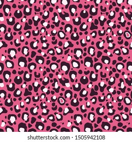 Seamless leopard pattern. Dark and white spots on a pink background. Design of fabric and clothes. Fashion