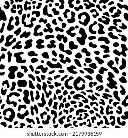 Seamless leopard pattern. Fashionable vector illustration. Black spots on white background. Animal texture for print, textile, fabric.