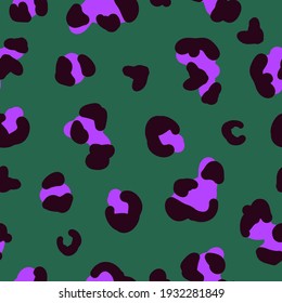 seamless leopard pattern. green background. black purple leopard spots. vector texture. trend print for textiles and wallpaper.