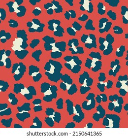 Seamless leopard pattern print in off-white, dark red and navy blue.