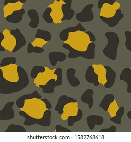 Seamless leopard pattern. Yellow, green and brown. Vector.