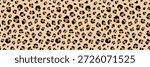 Seamless leopard print pattern with brown spots on beige background. Vector animal skin texture perfect for fabric design, fashion textiles, and safari-themed decoration projects.