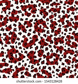 Seamless leopard print pattern with dark red overlapping small and big spots. Animal repeat vector surface pattern.