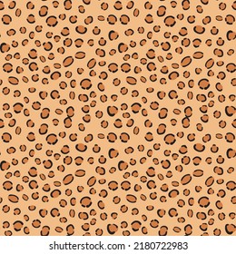 Seamless leopard print pattern on beige. Trendy background for fabric, paper, clothes.