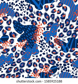 Seamless leopard skin pattern with abstract elements. Vector.