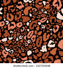 Seamless leopard wild nature pattern on black. Vector animal print.