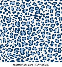 Seamless leopard/jaguar print vector pattern with hand drawn spots in shades of classic blue. Animal print surface pattern.