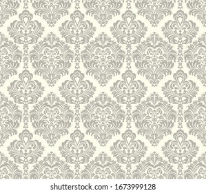 Seamless light background with brown pattern in baroque style. Vector retro illustration. Ideal for printing on fabric or paper for wallpapers, textile, wrapping. 