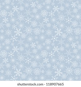 Seamless light blue snow flakes pattern