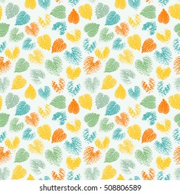 Seamless light color realistic pattern  with a silhouette of the leaves. Colorful background with  imprints of autumn leaves. Vector illustration.