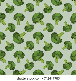 Seamless light-green pattern with green fresh broccoli. Broccoli in cartoon style. Vector illustration.