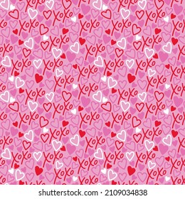 Seamless love pattern. Seamless vector pattern with Xoxo lettering and hearts. Valentine's day pattern. Love background for wrapping paper, cards, fabric, etc.