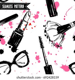 Seamless makeup cosmetics pattern. Vector hand drawn graphic fashion illustration: glasses,  makeup brush, lipstick, Brush of Mascara, mascara. Seamless pattern With pink and black ink sprays.