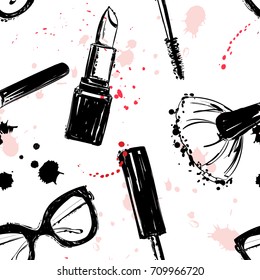 Seamless makeup cosmetics pattern. Vector hand drawn graphic fashion illustration: glasses, brush, makeup brush, lipstick, Brush of Mascara, mascara. Seamless pattern With pink and black ink sprays.