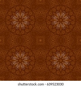 Seamless Mandala. Seamless oriental pattern. Doodle drawing. Hand drawing. Snowflake, brown motifs