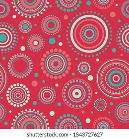 Seamless mandala pattern with circles and dots on red background. Kaleidoscope wallpaper. Decorative wallpaper, good for printing. Vector illustration.