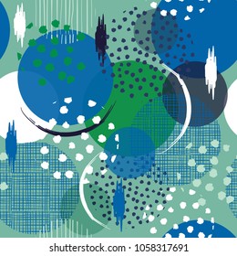 Seamless many pattern in big polka Dots. Fill in with hand drawn texture in sketch and paint style. modern pattern with another shape of dot for fashion fabric and all prints on pastel green 