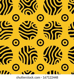 Seamless maze pattern with cut black circles on yellow