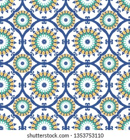 Seamless medallion pattern in Blue, yellow and turquoise color combo in white background