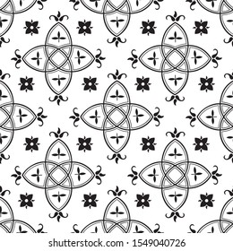 Seamless medieval pattern. Gothic style background. Abstract floral motif. Vector illustration in black and white.