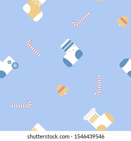 seamless merry christmas and happy new year with yellow and blue sock, candy cane and bell winter season repeat pattern in blue background, flat vector illustration cartoon character decor