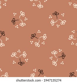 Seamless minimalist doodle floral pattern background. Calm boho earthy tone color wallpaper. Simple modern scandi unisex flower design. Organic childish gender neutral baby all over print. Hand drawn.