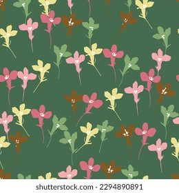 seamless mixed colourful tiny flowers pattern on green  background for fashion fabric