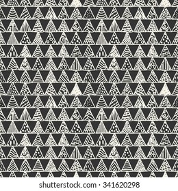 Seamless modern abstract monochrome pattern of triangles with different patterns