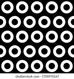 Seamless modern circles repeat vector pattern with abstract circle hoop shapes in a black and white monochrome color scheme. Perfect for fashion design, textile design, home decor and fabric printing.