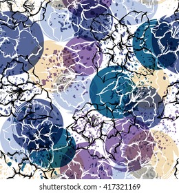 Seamless modern floral pattern with gladioli, spots, blots and splashes of paint.