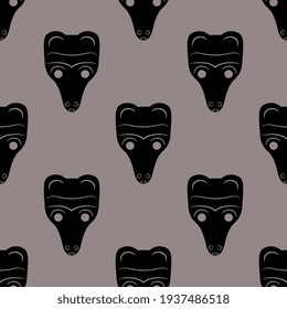 Seamless monochrome animal pattern with bear heads. Ancient Siberian totem.